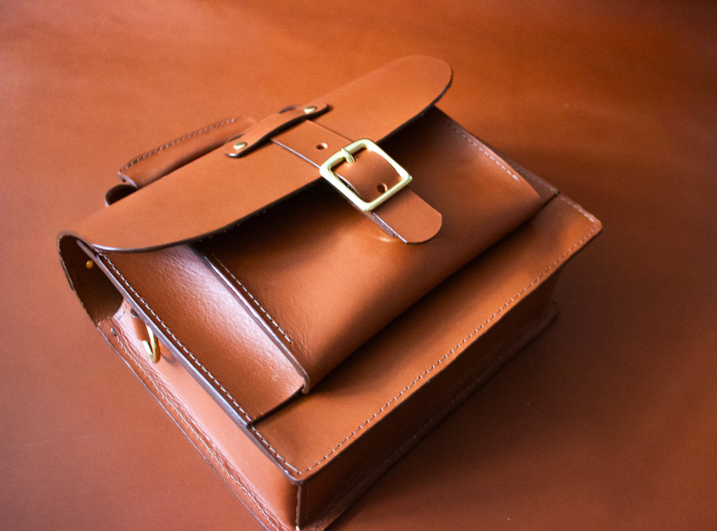 The Nomad Crossbody bag - Brown Brass