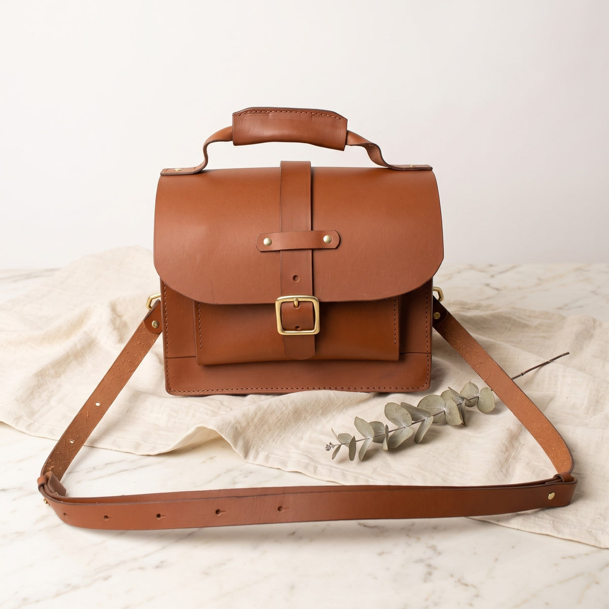 The Nomad Crossbody bag - Brown Brass